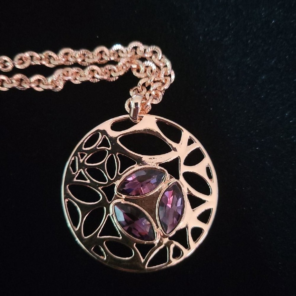 Rose gold plated pendant with purple rhinestone